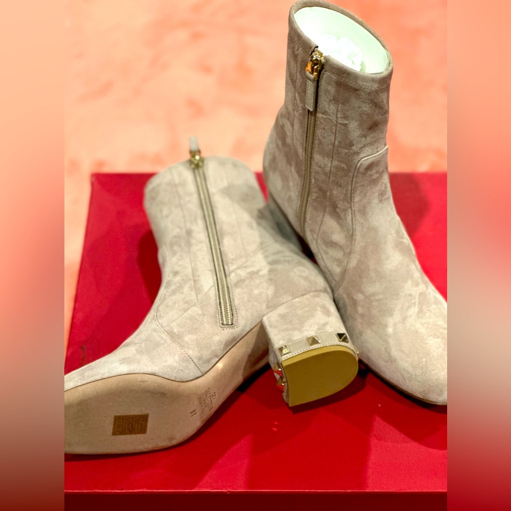 Suede Beige Valentino boots with studs on heels. From the RealReal.